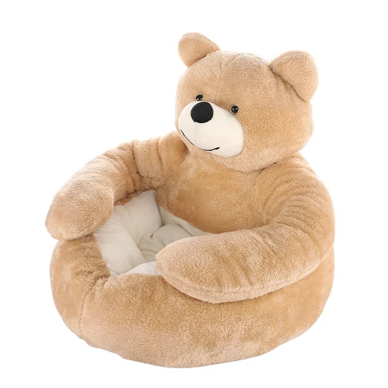 Beige plush teddy bear shaped pet bed with soft padded arms and a comfortable round sleeping area