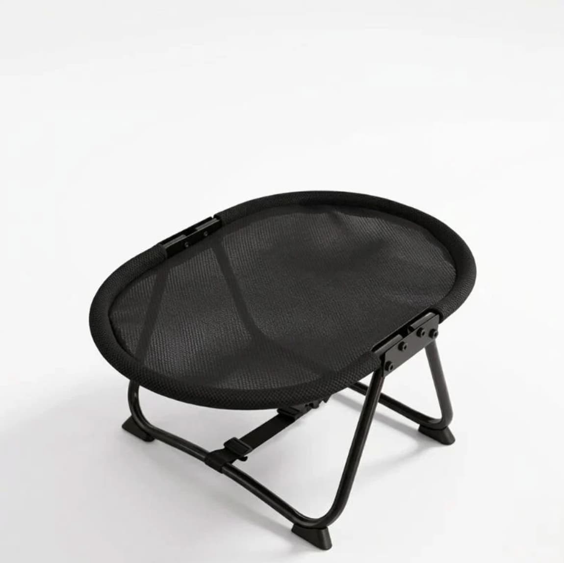 Black round elevated cat hammock bed with sturdy folding frame on clean white background