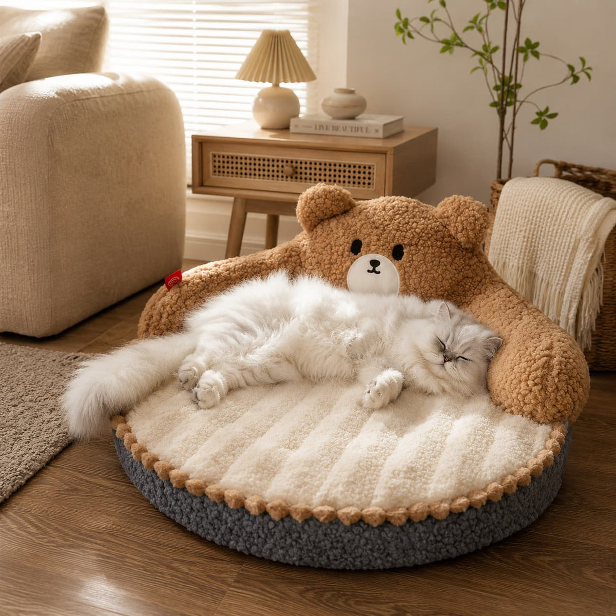 White cat relaxing comfortably on a plush brown bear shaped pet bed in a warm living room