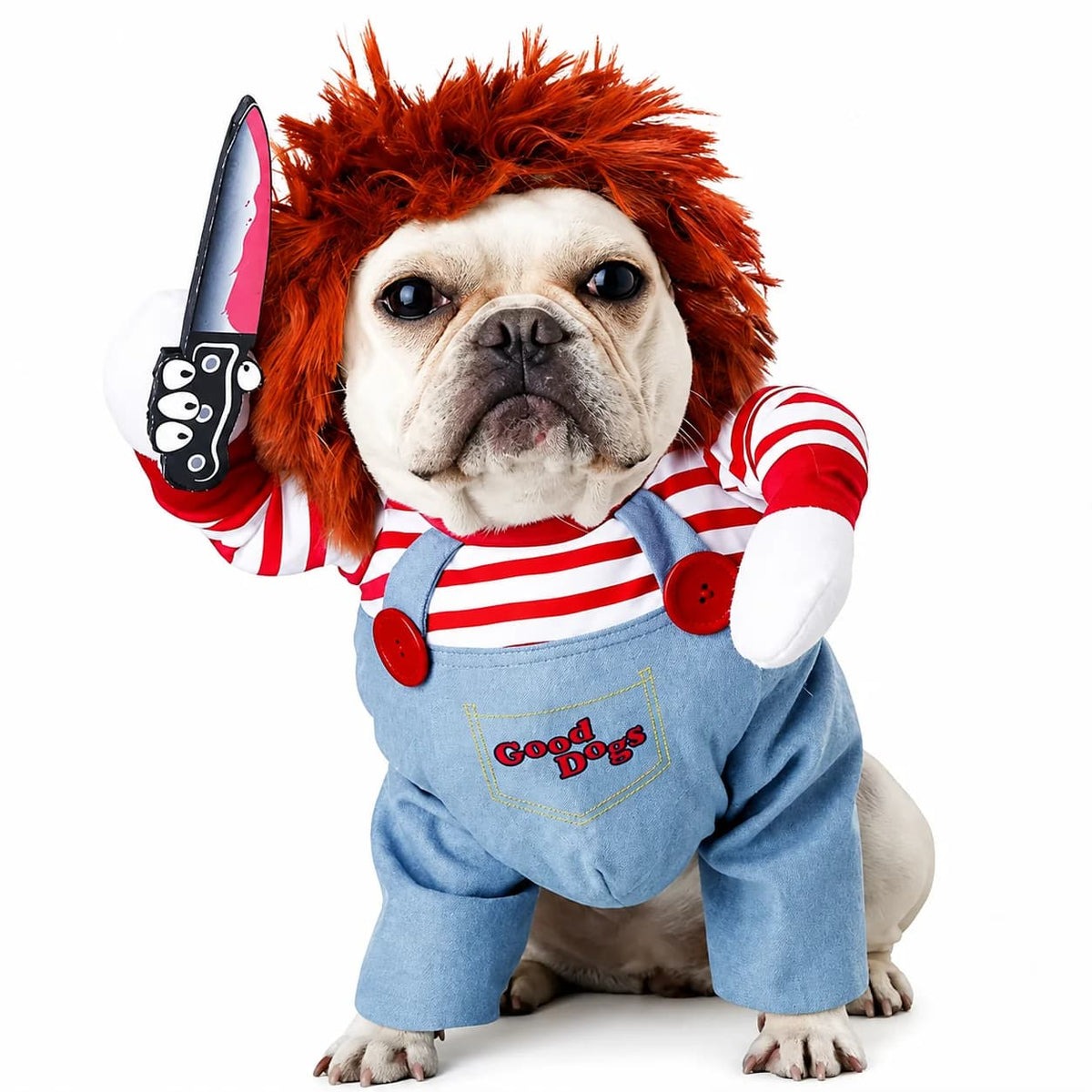 Bulldog wearing a red haired Chucky style dog costume with striped shirt and blue overalls.