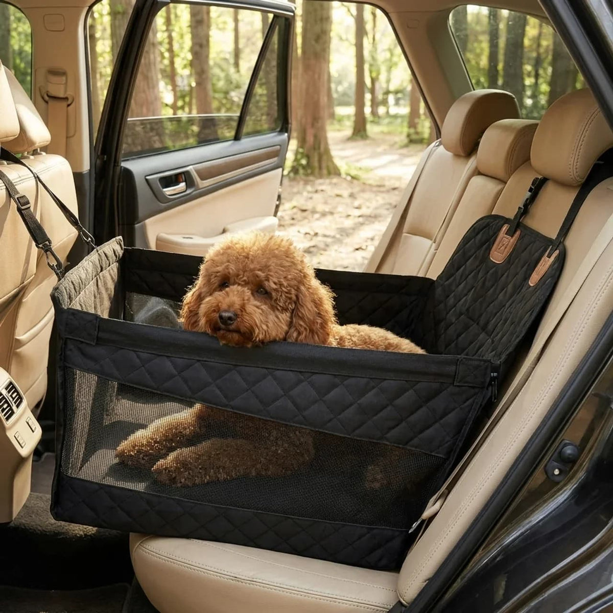 Dog relaxing securely on a black quilted car back seat cover with breathable mesh window
