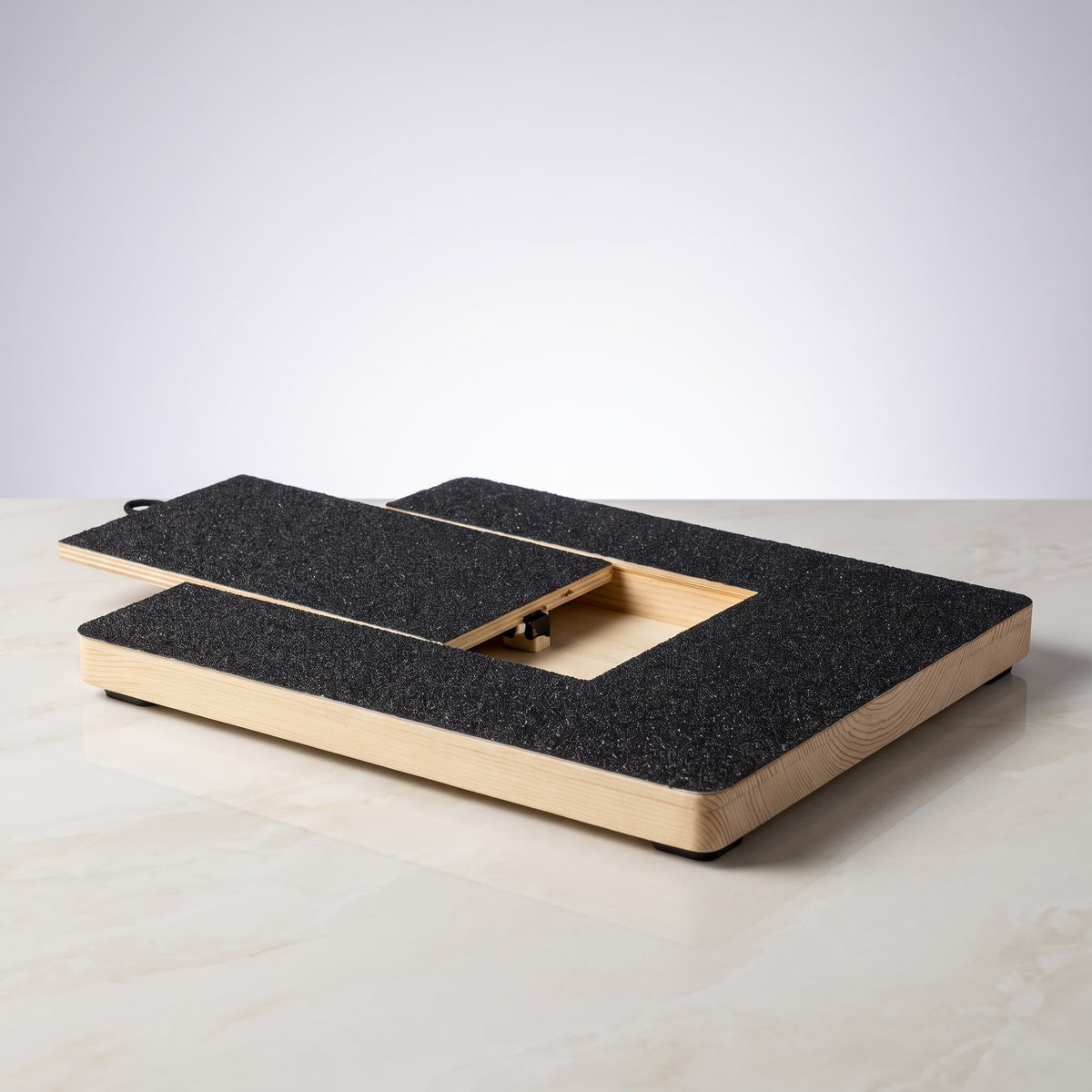 Dog nail scratch board with textured filing surface and built in treat compartment