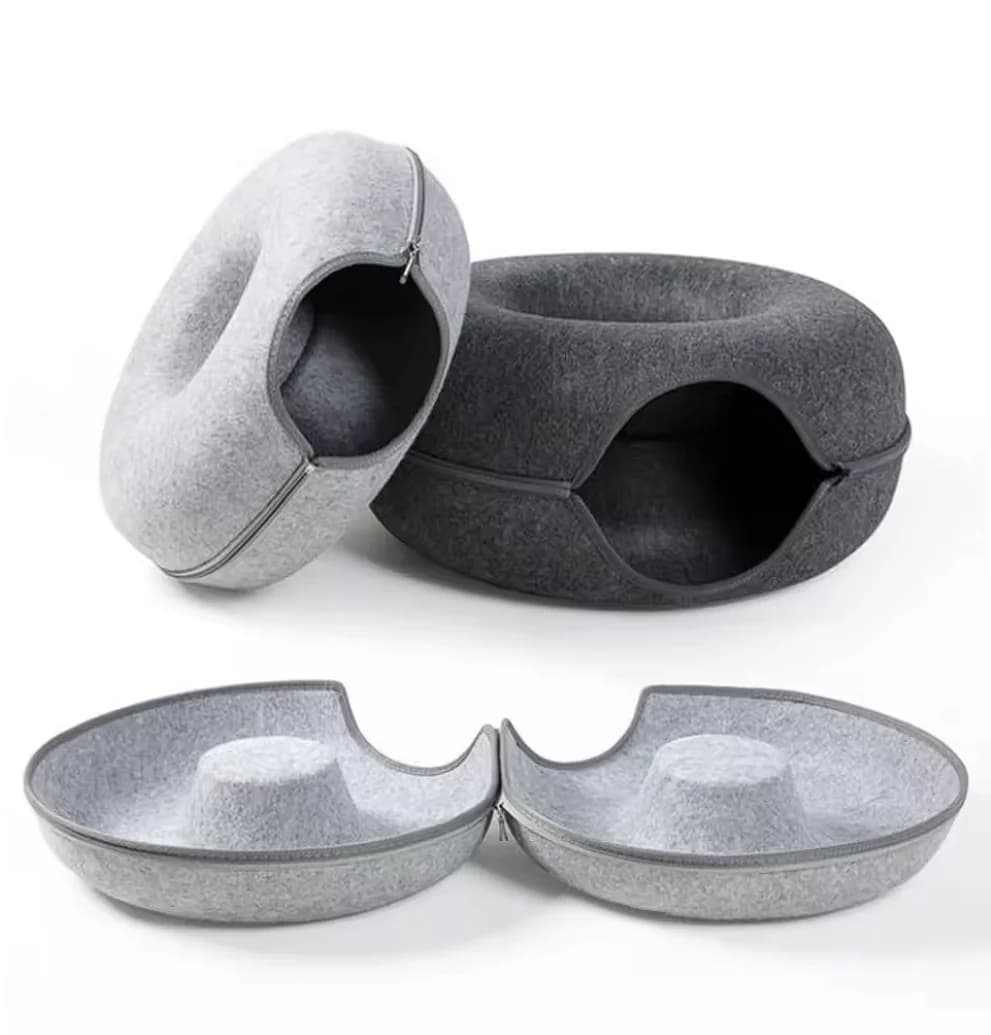 Grey cat cave bed shown with its removable upper cushion and soft interior sleeping compartments