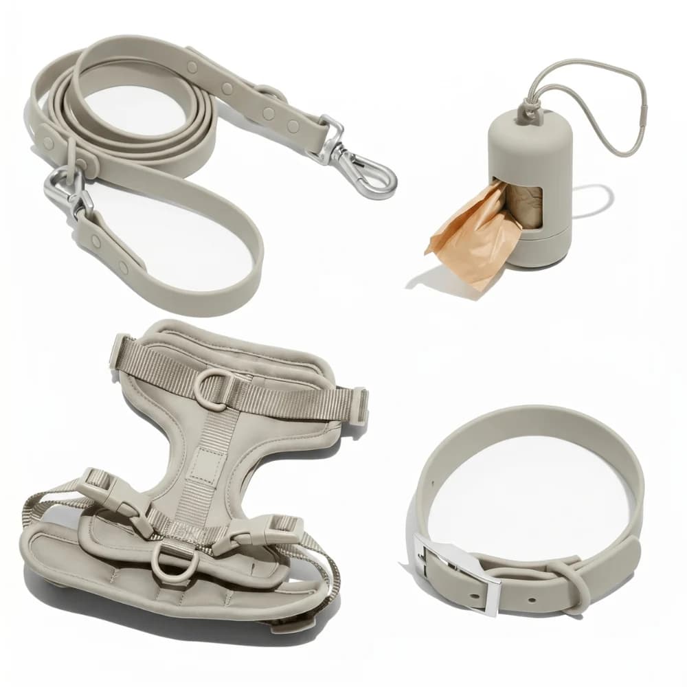 Light grey dog walking set featuring adjustable harness, matching collar, lead and waste bag dispenser.
