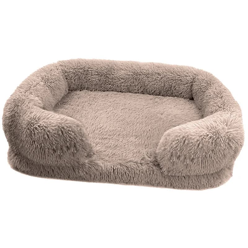 Grey plush dog bed with raised supportive sides and a soft cushioned centre