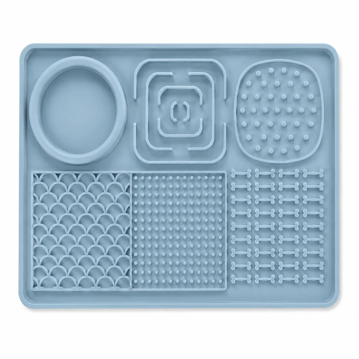 Light blue rectangular dog slow feeder lick mat featuring raised patterns, textured feeding areas and a built-in bowl.