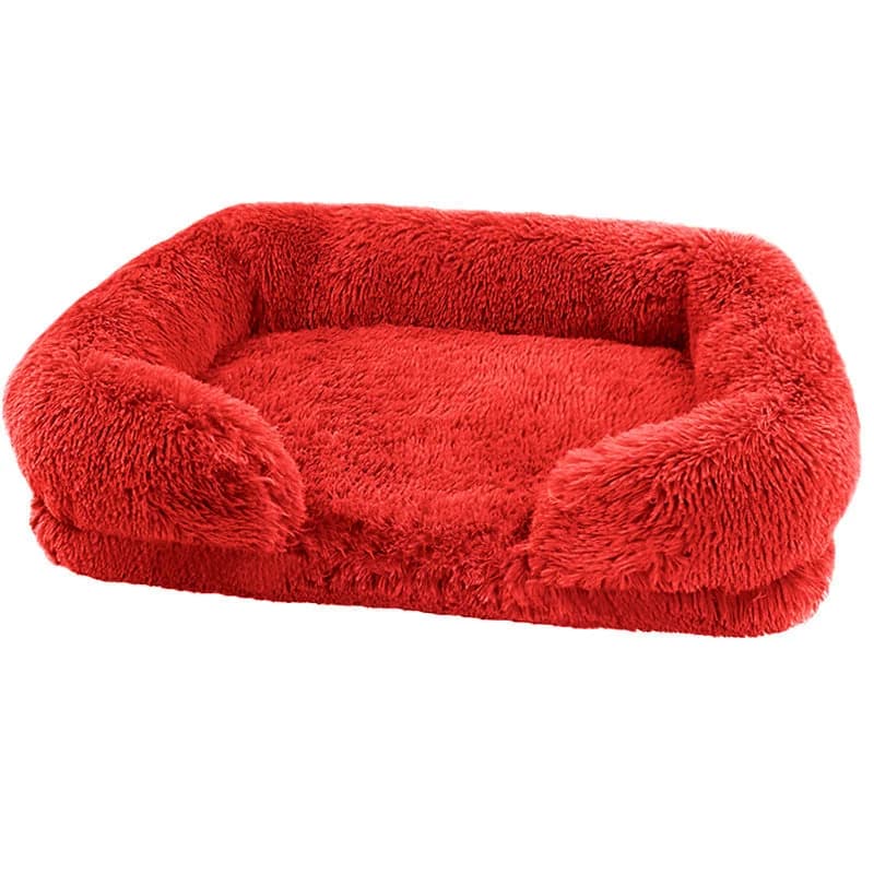 Red rectangular plush dog bed with raised cosy sides and a soft sleeping area