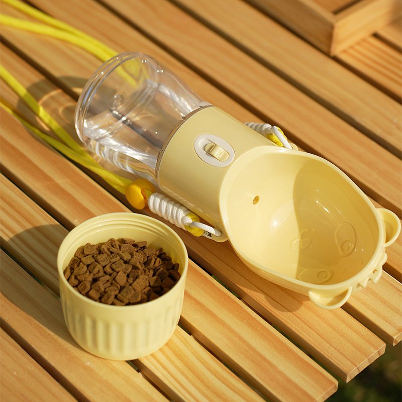 Dog water bottle food compartment open showing kibble storage